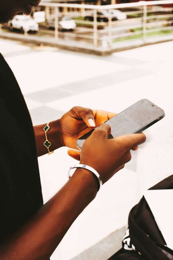 Close-up of hands holding a smartphone