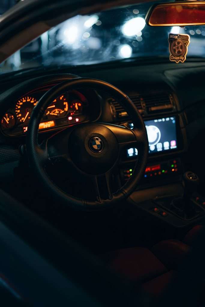 Car interior at night with ambient glow
